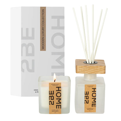 Productweergave van de 2BEHOME White Musk giftset met geurkaars en geurstokjes.